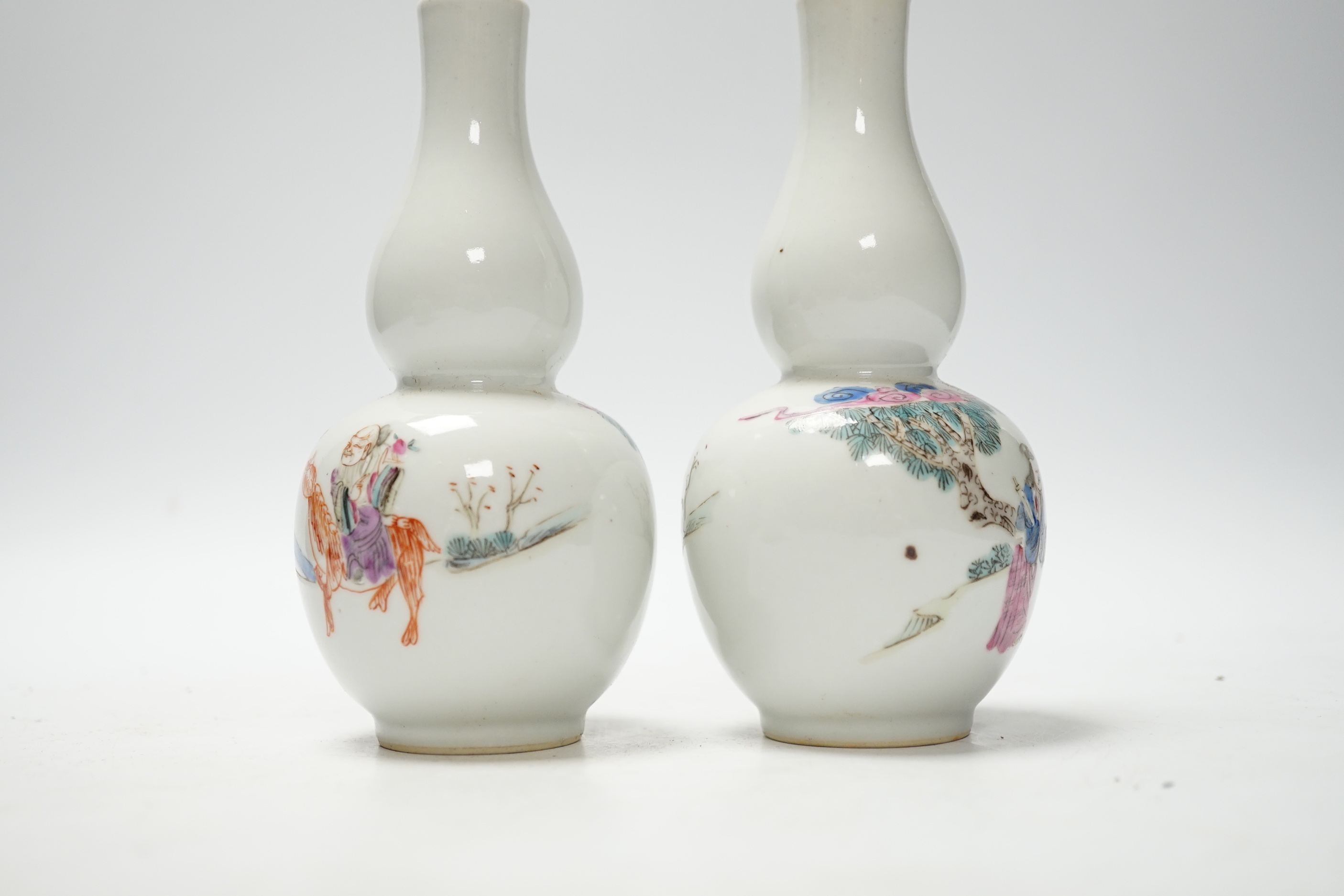 A pair of Chinese double gourd shaped vases and a small ginger jar, vases 15cm (3)